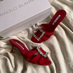 New, In Boxsize 37.5 Color: Red Manolo Blahnik "Iluna" Sandals In Crepe De Chine, Embellished With Crystal Buckle.50mm Heel.Three-Band Upper.Slide Style.Leather Lining And Sole.Made In Italy. About Manolo Blahnik: Manolo Blahnik, The Elegant Master Of Women's Shoe Design, Was Born In Spain's Canary Islands. After Studying Architecture In Geneva, He Relocated To Paris And Then London, Where He Opened His First Boutique. The Manolo Blahnik Line Has Earned Icon Status; The Distinctively Sexy And So Manolo Blahnik Kitten Heels, Manolo Blahnik Green, Manolo Blahnik Pink, Manolo Blahnik Flats, Manolo Blahnik Sandals, Ankle Strap Sandals Flat, Manolo Blahnik Black, Manolo Blahnik Hangisi, Ankle Strap Sandals Heels