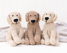 three crocheted dogs sitting next to each other on a white background with the words crochet pattern