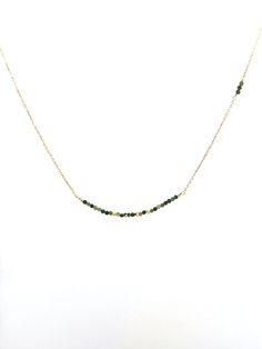 This Must Have Stone Necklace features different colorful stones chosen for their individual special properties, making it an elegant and meaningful choice. Crafted with exquisite crystals and 18k gold plating, this necklace is sure to make a statement and is a perfect gift for a special occasion. Elegant Gold Beaded Necklace With Gemstone Accents, Gold Emerald Necklaces With Gemstone Beads, May Birthstone Gemstone Beaded Necklace Gift, Elegant Tourmaline Necklaces With Natural Stones, Elegant Tourmaline Beaded Necklace With Natural Stones, Yellow Gold Necklaces With May Birthstone Natural Stones, Yellow Gold Necklaces With May Birthstone, Elegant Tourmaline Necklace With Natural Stones, Yellow Gold Necklace With May Birthstone Natural Stones