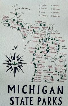 the michigan state parks map is shown in black and white with green trees on it