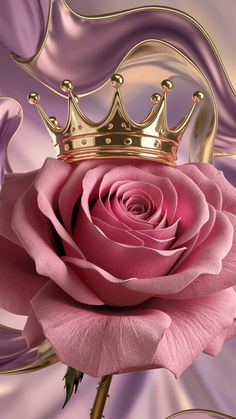 a pink rose with a gold crown on it