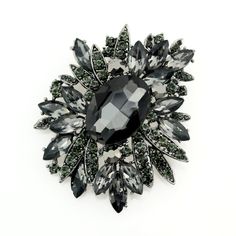 Large rhinestone black brooch embellishment, which can be used for your DIY project - wedding, bridal broach bouquet, bridesmaid dress decor, clutch, ring pillow, invitations, cake and frame decorations, event decor, crafts, scrap booking, jewelry gift and much more! Size: 3 inch high 2 1/2 inches wide Stone color: Black, charcoal gray Metal: dark silver plated Please note that this rhinestone broach jewelry embellishment has flat backing but if you prefer to have it with pin so you can use it as a brooch, please add a note during the check out and we will be happy to add a pin free of charge. More BLACK Brooches - https://www.etsy.com/shop/Crystalitzy?section_id=16137850 Please note that this crystal rhinestone embellishment has flat backing, it is suitable only for your sew-on or glue-on Pin Dress, Bouquet Bridesmaid, Bridal Brooch Bouquet, Brooch Dress, Dress Decoration, Ring Pillow, Brooch Bouquets, Crystal Brooch, Black Rhinestone