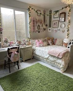 a bedroom decorated in pink and white with lots of stuffed animals