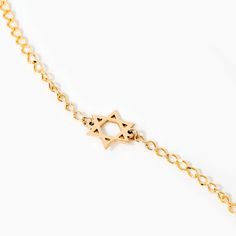 Star of David 14K Gold Bracelet This 14K Solid Gold Dainty Star of David Chain Bracelet is a timeless piece of jewelry that symbolizes faith and heritage. Perfect for elegant women, this gourmet chain bracelet features a delicate star of David, adding a sense of grace and sophistication. It's a fantastic present for the special woman in your life, showcasing beauty and devotion in its most subtle form. You'll have: 14k solid gold handcrafted pieces 100% ethical sourced jewelry Size Material: 14k 14k Gold Bracelet With Star Charm, Dainty Star Of David Jewelry With Adjustable Chain, Yellow Gold Star Of David Jewelry With Delicate Chain, 14k Yellow Gold Bracelet With Star Charm, Adjustable Gold Star Of David Jewelry, Classic Yellow Gold Star Of David Jewelry, Bracelet Stands, Jewish Star, Solid Gold Chains