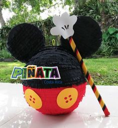 a mickey mouse pinata sitting on top of a table