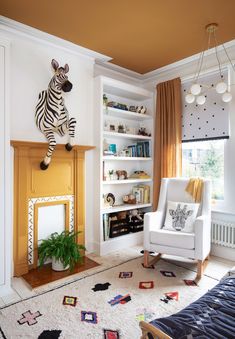 a room with a zebra on the wall