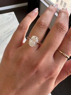 How big do you think this diamond looks? This is a stunning 3.36 carat oval cut diamond via Adiamor

Click to find your perfect oval cut diamond on www.stonealgo.com Solitaire Engagement Ring Setting, Gold Band Engagement Rings, Classy Fits, Future Engagement Rings, Ring Inspo