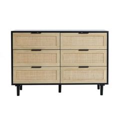 an image of a dresser with wicker drawers and black handles on it, against a white background