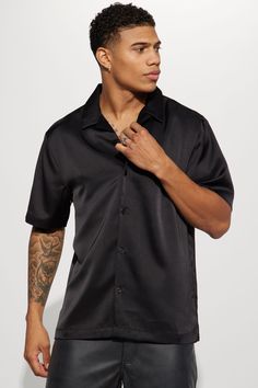 Available In Black. Fold Down Collar Front Button Closure Short Sleeve 100% Polyester Imported | Mens Links Satin Short Sleeve Button Up Shirt in Black size XL by Fashion Nova Black Collared Tops With Button Closure, Black Fitted Top With Camp Collar, Fitted Black Shirt With Camp Collar, Black Tops With Spread Collar And Button Closure, Black Top With Button Closure And Spread Collar, Casual Black Top With Spread Collar, Classic Black Top With Camp Collar, Black Button-up Camp Shirt With Button Closure, Black Button-up Camp Shirt