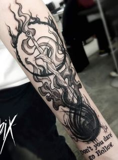 a person with a tattoo on their arm