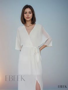 Ebeek - Premium Surplice Neck Maxi Dress with Ruched Half Sleeves - Sophisticated Womens Fashion Attire Chic Chiffon V-neck Wrap Dress, Chic V-neck Chiffon Wrap Dress, Chic Chiffon Wrap Dress, Elegant V-neck Chiffon Wrap Dress, Elegant Midi Dress With Surplice Neckline For Brunch, Chic Chiffon Wrap Dress For Spring, Chic Flowy Wrap Dress For Formal Occasions, Spring Ruched Wrap Dress, Elegant Chiffon Wrap Dress