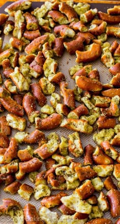 some kind of food that is sitting on a pan and ready to be cooked in the oven