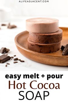 three chocolate soap bars stacked on top of each other with text overlay that reads easy melt + pour hot cocoa soap