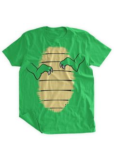 a green t - shirt with two hands on it