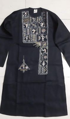 a black shirt with white designs on it