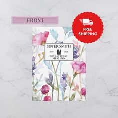 the front and back cover of a book with watercolor flowers on white marble background