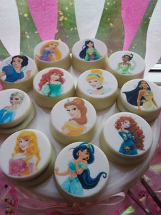 there are many princess cupcakes on the plate