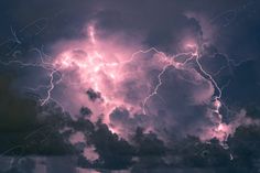 a large cloud filled with lots of lightning