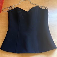 Pure Wool, Black Sadota Bustier/Corset. Never Worn. Size Australian 8 Like A 34b, Size 2-4. Black Cocktail Corset With Lined Bodice, Sleeveless Fitted Corset For Cocktail, Sleeveless Fitted Corset For Cocktail Occasions, Formal Black Corset With Lined Bodice, Black Fitted Bodice Top For Night Out, Elegant Black Evening Corset, Fitted Sleeveless Corset For Evening, Elegant Fitted Black Corset, Chic Evening Corset With Straps