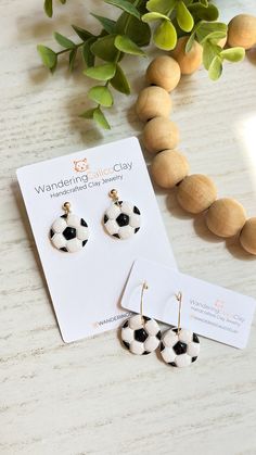 Show off your love for soccer with these stylish polymer clay soccer ball earrings, available in both dangles and hoops! Perfect for players, fans, and fashion enthusiasts, these earrings are a fun and fashionable way to celebrate your favorite sport. Each earring is handmade with nickel safe, lead and cadmium free 18K gold plated brass ball post or ear wire, which make them safe for sensitive ears, and the lightweight design ensures they are comfortable to wear all day long. The diameter of the Soccer Ball Clay Earrings, Mom Sports Clay Earrings, Soccer Earrings, Sports Earrings, Mom Earrings, Football Earrings, Unique Products Design, Sports Jewelry, Ball Earrings