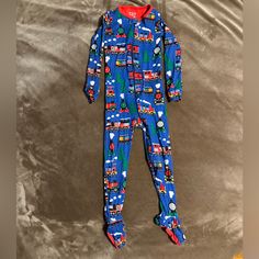 Children’s Place Train Footy Pajama. Never Worn, Tags Were Removed. See Photos Of Feet. Bundle & Save! T12 Kids Pajamas, Pajama Sets, Childrens Place, See Photo, Pajama Set, Kids Shop, Pajamas, Color Blue, Train