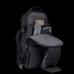 a back pack with two cell phones in it's pocket and an electronic device sticking out of the compartment