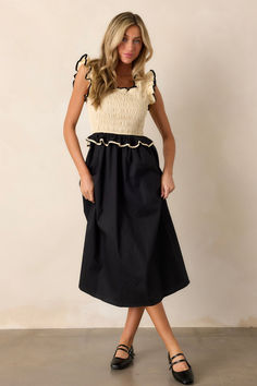 Experience love that never ends with the Endless Love Ivory & Black Smocked Midi Dress. Show off your adventurous style and take risks with this daring and chic dress! This bold dress features a unique smocked top. an alternating white and black design and a tie in the back for adjusting the bust.   100% Cotton Lined: 100% Cotton Hand Wash Cold Designed in USA Manufactured in China Model is 5'8" wearing a size Small White And Black Design, Bold Dress, Halter Bridesmaid Dress, Bold Dresses, Smocked Top, Endless Love, Black Dresses Casual, Take Risks, Red Midi Dress