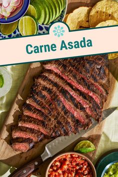 a large steak on a wooden cutting board with salsa and tortillas around it