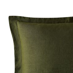 two green pillows sitting next to each other