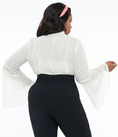 This darling plus size blouse is crafted in a beautiful sheer ivory woven boasting diamond clip dots throughout. Outfitted with a self-tie neckline and long bell sleeves. Complete with a button down front.Available in sizes XS-4X while supplies last. Long Bell Sleeves, Plus Size Blouse, Bow Blouse, Plus Size Blouses, Unique Vintage, Bell Sleeves, Shop Now, Dots, Plus Size