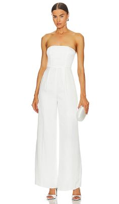 Find LOVERS AND FRIENDS Cambri Jumpsuit In Ivory on Editorialist. Lovers and Friends Cambri Jumpsuit in Ivory. - size M (also in S, XL, XS) Lovers and Friends Cambri Jumpsuit in Ivory. - size M (also in S, XL, XS) 100% polyester. Made in China. Dry clean only. Hidden back zipper closure. Boned bodice. Stone washed satin fabric with subtle pleated detail. Neckline to hem measures approx 52 in length 24 at the knee and 24 at the leg opening. LOVF-WC322. ACJS395 F23. Constantly inspired by the laid White Strapless Jumpsuit For Evening, Elegant White Strapless Jumpsuit For Party, Elegant White Strapless Jumpsuit For Summer, White Sleeveless Jumpsuits And Rompers For Formal, White Sleeveless Jumpsuits And Rompers For Formal Occasions, White Fitted Jumpsuits And Rompers For Formal Occasions, White Sleeveless Jumpsuit For Formal Occasions, White Fitted Jumpsuit For Formal Occasions, White Fitted Formal Jumpsuits And Rompers