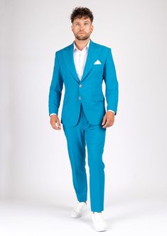 Dress to impress in the Hudson Sapphire Blue Stretch Suit! This suave custom suit is made from a stretch cotton fabric for a look that's both comfortable and vibrant. With its radiant hue, you're sure to turn heads at any event! So suit up - it's time to shine! Fitted Blue Long Sleeve Suits, Blue Cotton Notch Lapel Suit, Fitted Blue Suits For Spring, Tailored Blue Cotton Suit, Slim Fit Cotton Suit For Spring, Semi-formal Fitted Cotton Sets, Spring Slim Fit Cotton Suits, Fitted Cotton Set For Semi-formal Occasions, Fitted Cotton Sets With Notch Lapel