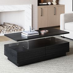 a black coffee table in front of a fireplace