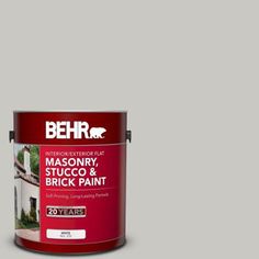 behr paint's masonry, stucco and brick paint is shown in dark gray