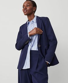 Elevate your wardrobe with the Ann Taylor Long One Button Notched Blazer, a symbol of sophistication and effortless style. This navy blazer is designed to flatter with its tailored fit and elegant single-button front.

- **Size**: 12 Regular
- **Color**: Navy
- **Gender**: Female
- **Material**: 73% Polyester, 24% Rayon, 3% Spandex; Lining: 100% Polyester
- **Features**: Notched lapel, long sleeves with button-open option, front flap besom pockets, back vent, fully lined
- **Length**: 27 inches Tailored Button-up Blazer For Career, Tailored Blazer With Button Cuffs For Business Casual, Professional Business Casual Button-up Blazer, Professional Button-up Blazer For Business Casual, Professional Blazer With Button Closure For Business Casual, Professional Blazer For Business Casual, Office Wear Button-up Blazer With Button Cuffs, Button-up Blazer With Button Cuffs For Office, Business Casual Button-up Blazer With Button Cuffs