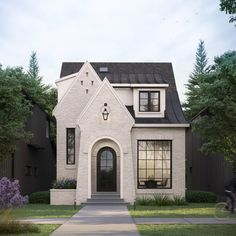 a white brick house with a black roof