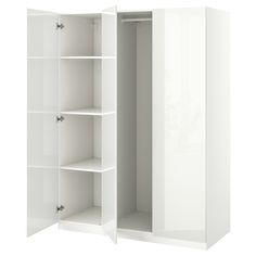 an open white closet with shelves on both sides