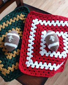 two crocheted potholders with footballs on them are sitting on a chair