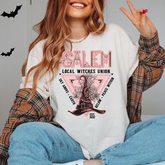 DESCRIPTION! Salem Witch Sweatshirt, Halloween Witch Shirt, 1692 Witch Shirt, They Missed One Shirt, Salem Massachusetts Shirt, Halloween Witchy Vibes -Personalization box is only for design color information. - This design will be made with heat press vinyl. - Backside design is additional fee, please make sure to add the fee into your purchase. - If you want to add or change anything on the existing design that we show in the display picture, please contact with the seller from message box to Relaxed Fit Long Sleeve Shirt For Halloween, Basic Witch Shirt, Pastel Goth Shirt, Witch Sweatshirt, Goth Shirt, Salem Massachusetts, Basic Witch, Salem Witch, Heat Press Vinyl