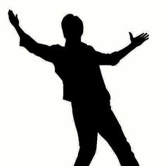 a man standing with his arms outstretched in the air, silhouetted against a white background