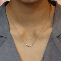 This classic yet unique diamond necklace is crafted in a lustrous 14k rose gold curved cluster pendant creating an eye-catching and chic look. The 7 white diamond pendant hangs gorgeously from a solid 14k rose gold cable chain. The length of the gold chain can be adjusted to either 16" or 18" long to suit your style! Adore her with this diamond drop pendant that can be made in your choice of white, rose, or yellow gold. ** The listing price is for one diamond necklace Availability: Ready to Ship Simple Unique Necklace, Luxury Delicate Round Pendant Diamond Necklace, 5 Stone Diamond Necklace, Simple Cute Necklaces, Rose Gold Chain With Pendant, Cluster Diamond Necklace, Classic Diamond Necklace, Minimal Diamond Necklace, Small Diamond Necklace Simple