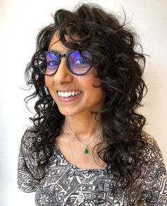 Fun Long Bouncy Curly Shag with Glasses Shag With Glasses, Layer Curly Hair, Curly Hair With Glasses, Hair With Glasses, Haircuts For Thick Wavy Hair, V Shaped Layers, Hairstyles For Thick Wavy Hair, Hairstyles For Wavy Hair, Curly Shag