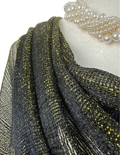 This versatile shimmery shiny shawl with fringe can be used to dress up an outfit for a special evening, a wedding or as a neck scarf in spring. Effortlessly give a dress a new look by simply adding this shawl. Perfect as bridesmaid gifts or wedding favours, the perfect gift for any occasion. This is not a very large shawl. There is metallic thread woven in the shawl that gives shining shimmery look.  Measures 20"Wx 75" The colours are very close however not exact. I tried to to capture the colo Elegant Gold Scarf One Size, Gold Shawl For Evening And Festive Occasions, Gold Shawl For Festive Evening, Gold Shawl For Festive Evening Events, Festive Gold Shawl For Evening, Festive Evening Gold Shawl, Festive Shawl Scarf For Party, Festive Party Shawl Scarf, Mesh Scarf