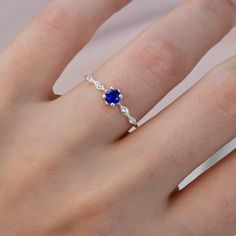 14k Gold Round Cut Sapphire Ring, Sapphire Engagement Ring, Sapphire Birthstone Ring, Sapphire Promise Ring,  Gift For Her, Mothers Day Gift Item Main Gemstone: AAA Grade Sapphire Cubic Zirconia Side Gemstone: AAA Grade White Cubic Zirconia  Size: 4mm - 1*50mm Color: Blue and Diamond Shape: Round Average Quality: AAA+ 🎉All of gold options of the product are produced from solid gold. 🎉While using the product, it's healthier to avoid touching the cream and similar products in terms of cleaning the product. 🎉Items are shown larger in pictures to show details-please note the dimensions. Package 🎀 All of these products are sent carefully packed in elegant jewelry boxes. 🎁 How to order 🤳🏼 🎉First step: Click on the product. 🎉Second Step: Select the material. 🎉Third Step: Select the ring Sapphire Birthstone Ring, Engagement Ring Sapphire, Sapphire Birthstone, Ring Sapphire, Promise Ring Gift, Sapphire Engagement Ring, Sapphire Engagement, Engagement Rings Sapphire, Diamond Shape