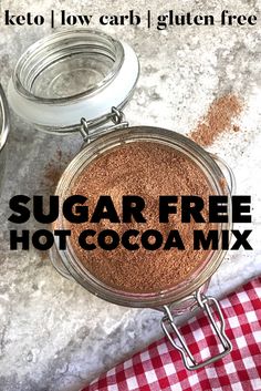 sugar free hot cocoa mix in a glass jar on a checkered tablecloth with the words sugar free hot cocoa mix