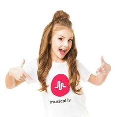 a girl with long hair wearing a musically t - shirt