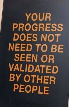 a sign that is on the side of a door saying, your progress does not need to be seen or validated by other people