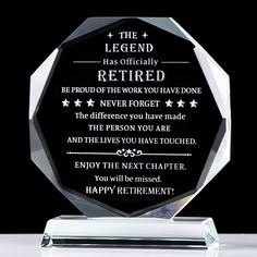 a crystal award with the words, legend has officially retired and never forget to be forgotten