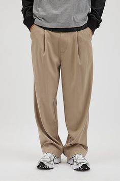 Jason pleated trouser pants by Standard Cloth. Relaxed straight leg pants with seamed detailing for a classic tailored look. Includes pockets at the front and back & a zip fly and button closure. Urban Outfitters exclusive. Features Standard Cloth Jason pleated trouser pants Tailored look pants Front & back pockets Zip fly; button closure Relaxed fit Straight leg UO exclusive Content + Care 66% Polyester, 32% viscose, 2% elastane Machine wash Imported Size + Fit Model in Chocolate is 6'2" and we Casual Solid Pants With Pressed Crease, Casual Dress Pants With Pressed Crease, Casual Pleated Tapered Leg Dress Pants, Casual Pleated Dress Trousers, Casual Pleated Dress Pants, Casual Pleated Straight Leg Dress Pants, Pleated Straight Leg Pants, Pants Tailored, Bdg Jeans