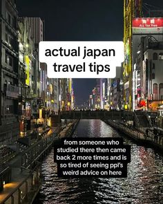 a river running through a city next to tall buildings with neon lights on them and the words actual japan travel tips